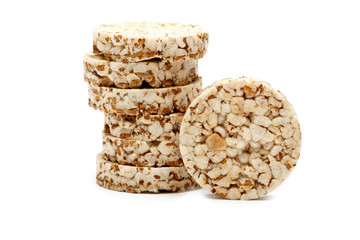 Crispy crispbread with buckwheat, rice and oatmeal isolated on white background. Crisp dietary fitness bread. Food for weight loss.