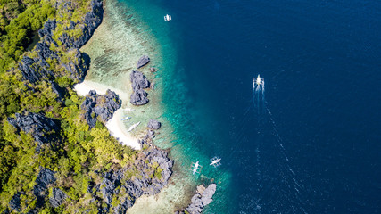 Aerial shot of local boats in El Nido Beach, Palawan, Philippines