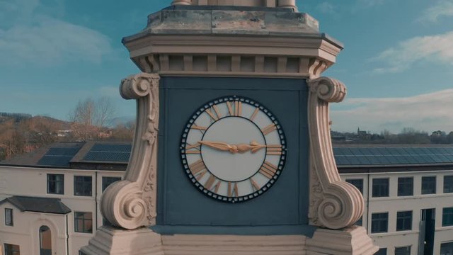 Clock tower birds landing on top