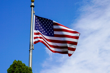 USA flag on the blue sky