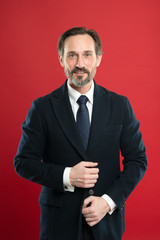 Well groomed. Hair grooming tips. Business man well groomed guy red background. Business people hairstyle. Stylish and modern appearance of mature guy. Well groomed bearded hipster. Perfect style