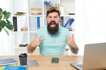 Respect me. Man arrogant rude boss with golden crown sit in office. Superiority and self...