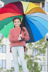 Girl child long hair with umbrella. Colorful accessory positive influence. Bright umbrella. Stay positive and optimistic. Everything better with my umbrella. Colorful accessory for cheerful mood