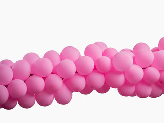 Pink color decorated balloons in a row over white background , with clipping path