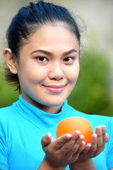 Woman And Happiness With Oranges