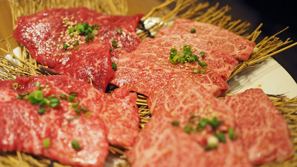 Red marble style japanese beef closeup. Selected focus.