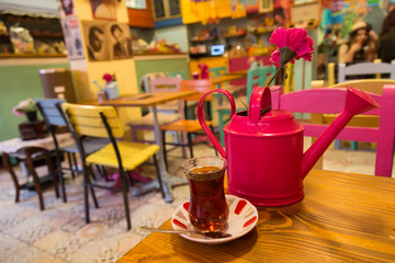A cup of coffee,service cake in the plate and tea for concept.