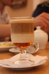 cup of coffee on wooden table