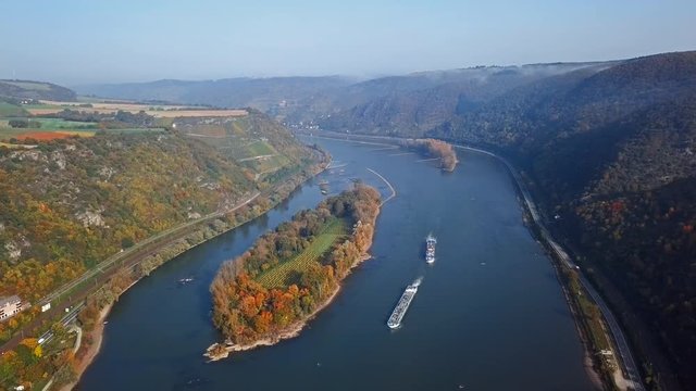 Flight over autumn Rhine valley near Bacharach town, Germany