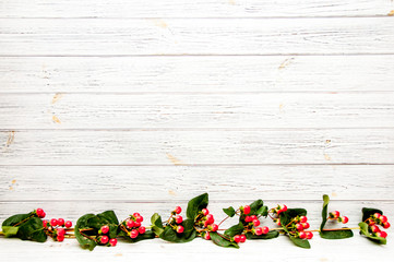 Flowers Hypericum on a light wooden background