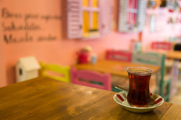 A cup of coffee,service cake in the plate and tea for concept.