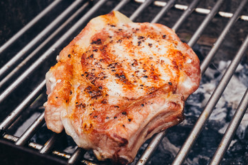 Pork chop on a grill