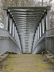 Metal footbridge over the M25 Motorway, Chorleywood, Hertfordshire, UK