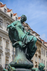 Obraz premium VIENNA, AUSTRIA - AUGUST 11, 2017: Donnerbrunnen fountain in Vienna, Austria. Baroque fountain located on Neuer Markt square. The fountain was built in 1737