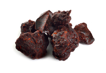 Dragon's blood red resin isolated on white background.