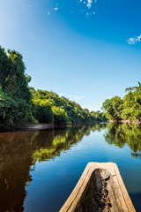 Beautiful blue sky reflecting in the Amazonia Basin river. Corocoro river goes along Yutaje Community whicth mean in the native language:  River Foam (Espuma del Rio)