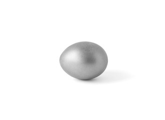 Egg of silver color are isolated on a white background. Gold. Handwork. Easter