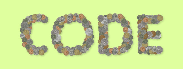 CODE – Coins on green background