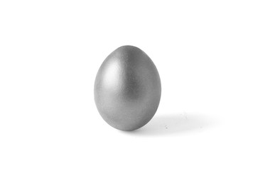 Egg of silver color are isolated on a white background. Silver. Handwork. Easter