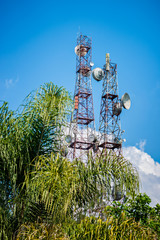 Telecommunications towers with blue sky background