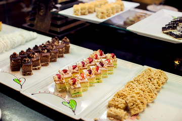 Close up delicious dessert pastry cakes. Fresh colourful sweet berry desserts, beautifull decorated in Egypt