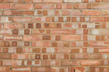 A full frame photograph of a decorative brick wall