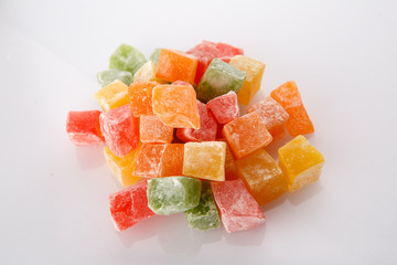 Different colours Turkish delight isolated on white background.