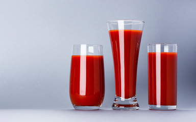 A glass of tomato juice isolated on white background with copy space, bloody Mary cocktail