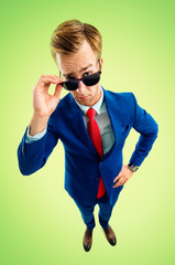 portrait of funny skeptic young businessman in sunglasses - obrazy, fototapety, plakaty