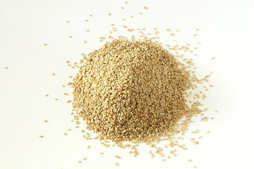 sesame Sesamum indicum or til seeds heap on white background top view