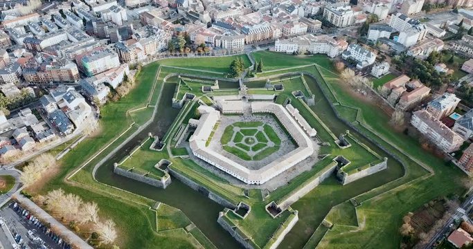 Aerial view of famous Citadel of Jaca on background of cityscape in sunny autumn day, Spain