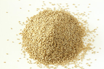 sesame Sesamum indicum or til seeds heap on white background top view