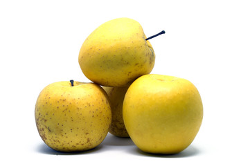 Several yellow apples folded by a slide