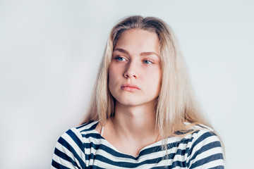 Horizontal view of depressed young woman