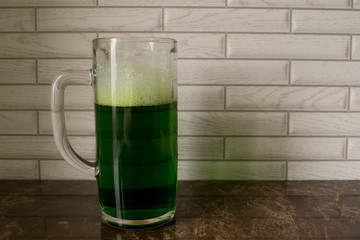 a glass of green beer