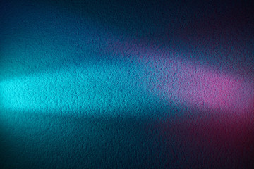 On a blue gradient background, a turquoise ray of light and a pink glow