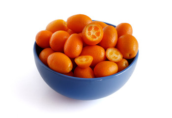 Kumquat fruits on a white background