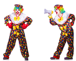 Funny male clown with boxing gloves and loudspeaker 