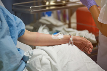 Patient with catheter in arm