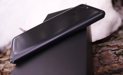 Modern smartphone based on the Android operating system. Details, close-up.