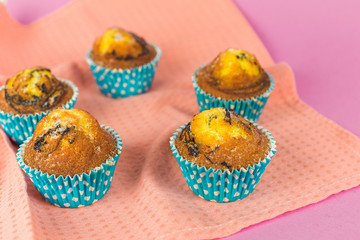 Homemade baked cakes with chocolate on colorful background. Food photo, dessert, sugar concept