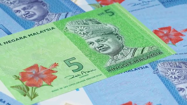 Malaysia currency ringgit notes slow rotating. Malaysian money. Low angle. Stock video footage