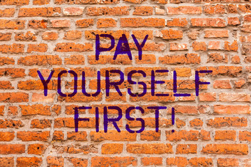 Conceptual hand writing showing Pay Yourself First. Business photo showcasing Personal Finance Save money for future Brick Wall art like Graffiti motivational written on wall