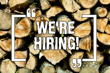Text sign showing We Re Hiring. Conceptual photo Workforce Wanted New Employees Recruitment Wooden background vintage wood wild message ideas intentions thoughts
