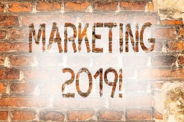 Writing note showing Marketing 2019. Business photo showcasing New Year Market Strategies Fresh start Advertising Ideas Brick Wall art like Graffiti motivational call written on the wall
