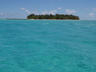 Azure waters of Saipan lagoon with Managaha Island in the background