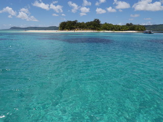 Managaha Island surrounded by Saipan’s clear blue waters and the coastal areas 