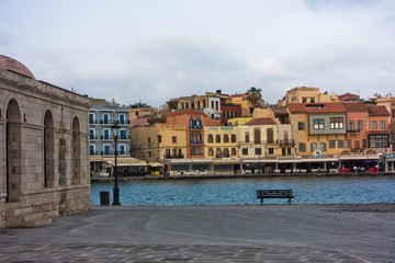 Waterfront at the city of Chania with old Venetian harbor near Kucuk Hasan mosque, island of Crete, Greece