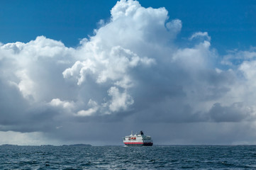 hurtigrouten cruiseship underway from Bergen to Kirkenes, Norway