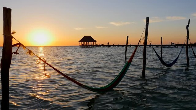 Mayan Riviera palm trees beach sunset at Holbox island in Caribbean sea of Mexico